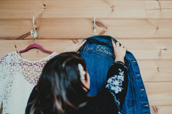 bride hangs up her denim jacket, styal lodge wedding photography, styal lodge wedding photographer, manchester wedding photographer, manchester wedding photography, cheshire wedding photographer, cheshire wedding photography