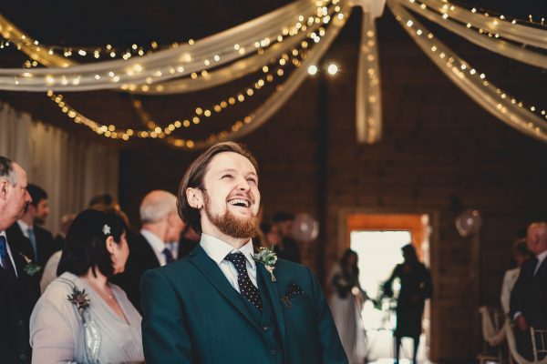 groom laughing as bride and her mum enter the wedding room, styal lodge wedding photography, styal lodge wedding photographer, manchester wedding photographer, manchester wedding photography, cheshire wedding photographer, cheshire wedding photography