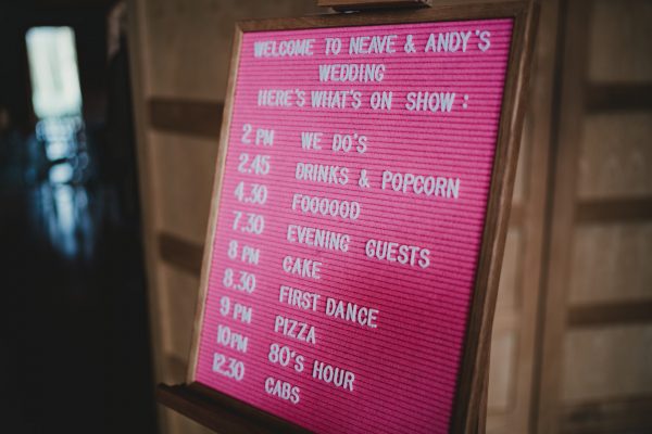 wedding running order on a pink notice board, styal lodge wedding photography, styal lodge wedding photographer, manchester wedding photographer, manchester wedding photography, cheshire wedding photographer, cheshire wedding photography