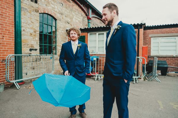 groomsmen hold an umbrella, elsecar heritage centre wedding photographer, elsecar heritage centre wedding photography, elsecar heritage centre wedding, ayesha photographer, manchester wedding photographer, manchester wedding photography, sheffield wedding photographer, sheffield wedding photography, barnsley wedding photographer, innercity weddings