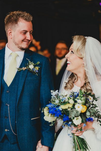 bride and groom look at each other at the end of the aisle, elsecar heritage centre wedding photographer, elsecar heritage centre wedding photography, elsecar heritage centre wedding, ayesha photographer, manchester wedding photographer, manchester wedding photography, sheffield wedding photographer, sheffield wedding photography, barnsley wedding photographer, innercity weddings